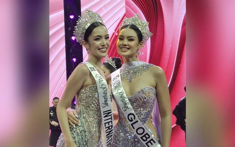 Gwendoline Soriano and Sasha-Juli Lacuna wearing their Binibining Pilipinas crowns